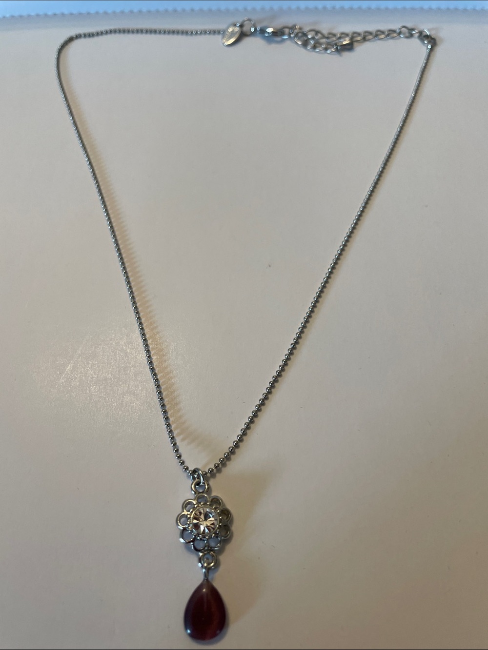 Lia Sophia Silver Floral Pendant Necklace with Wine Teardrop